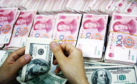 Центробанк Китая укрепил курс юаня к доллару до пятимесячного максимума